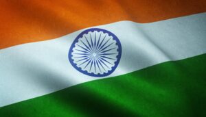 Indian national flag waving, symbolizing 78 years of independence and the ongoing fight against hunger, poverty, and corruption – Shaksham Group’s Independence Day 2025 message.