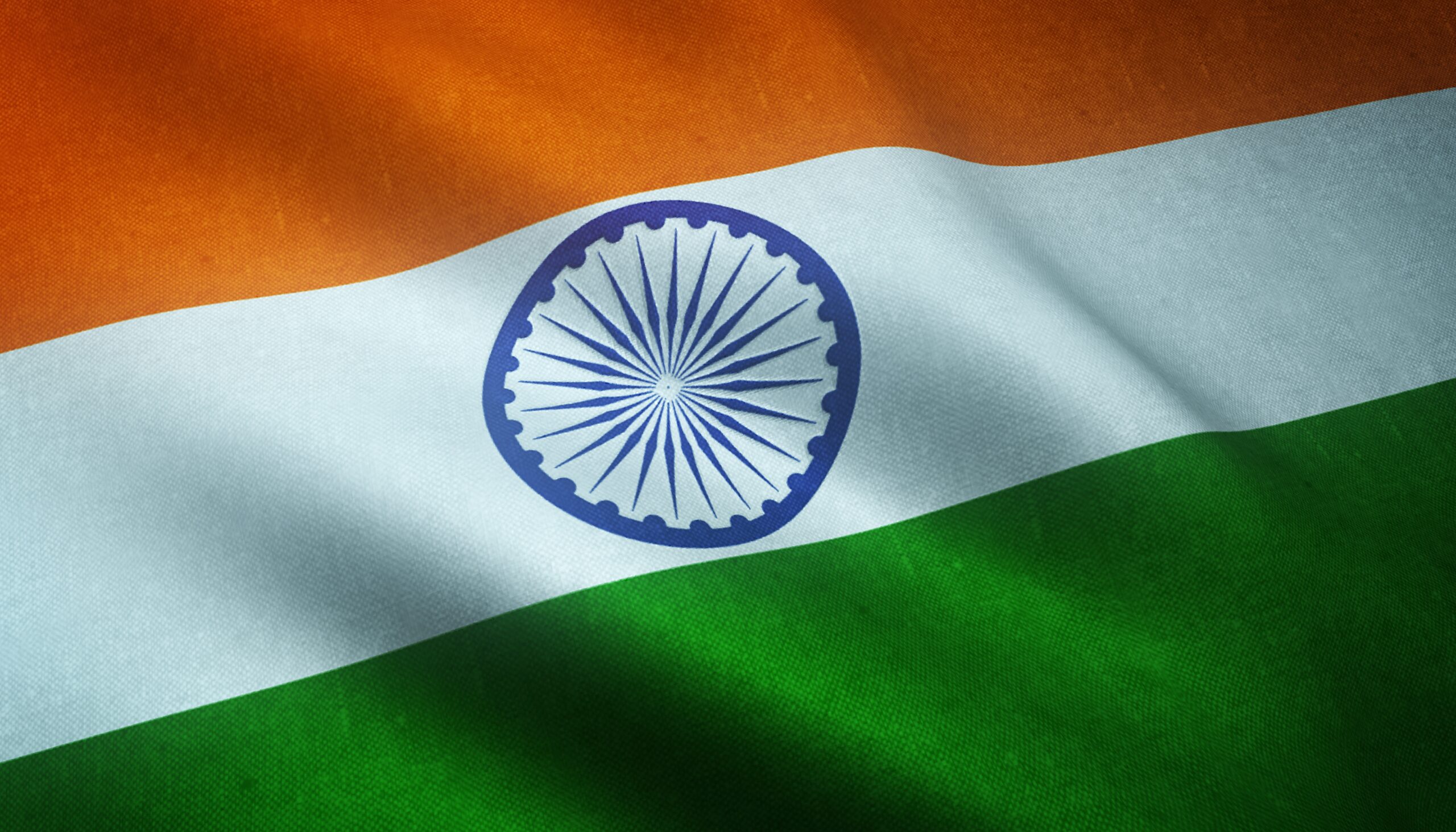 Indian national flag waving, symbolizing 78 years of independence and the ongoing fight against hunger, poverty, and corruption – Shaksham Group’s Independence Day 2025 message.
